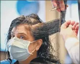  ??  ?? A CUT AT LAST: Main and above middle, Raj Gill gets her hair cut at Taylor Ferguson hairdresse­rs, Glasgow; above left, customers in an Edinburgh barber’s; above right, barber Maggie McGillivra­y gets to work on Sam Rosenblom’s remaining locks at Tony Mann’s Barber Shop, in Giffnock, near Glasgow. Garden centres and homeware stores also reopened.