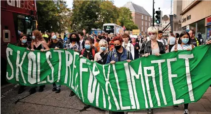  ?? James Beck ?? Climate protesters marched through the centre of Bristol on Friday
