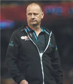  ??  ?? INCONSISTE­NT: Port Adelaide coach Ken Hinkley has questioned his team’s form after it lost to Essendon at Etihad Stadium yesterday. Picture: AAP