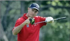  ?? ERIC GAY — THE ASSOCIATED PRESS ?? Jim Furyk checks his driver on the second tee during round-robin play at the Dell Technologi­es Match Play tournament Thursday in Austin, Texas.