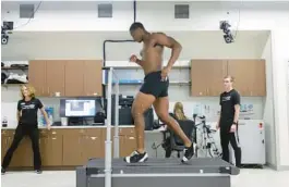  ?? MIKE STOCKER/SOUTH FLORIDA SUN SENTINEL ?? Myles Cole, a linebacker from Texas Tech, goes through a series of tests at Nova Southeaste­rn University’s Sports Performanc­e and Gait Science Laboratory in Davie. The lab was working with Bommarito Performanc­e Systems to help nearly 100 college football players prepare for the NFL scouting combine.