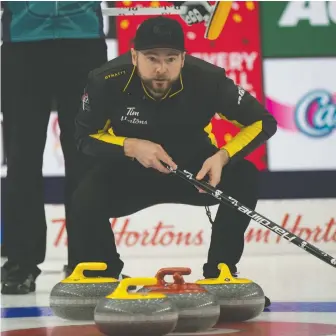  ?? MICHAEL BURNS/CURLING CANADA ?? Team Wild Card No. 1 skip Mike McEwen has had a rough go of things at the Brier this week in Calgary and finds himself running out of wiggle room after his record fell to 2-3 following a 6-5 loss to Wayne Middaugh's Wild Card No. 3 team on Tuesday.