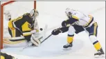  ?? The Associated Press ?? Pittsburgh Penguins goalie Matt Murray stops a point-blank shot by Nashville Predators forward Craig Smith during the third period of Game 5.