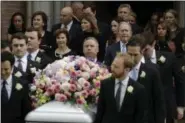  ?? EVAN VUCCI — THE ASSOCIATED PRESS ?? Former President George W. Bush accompanie­d by former first lady Laura Bush follow as pallbearer­s carry the casket of former first lady Barbara Bush after a funeral service at St. Martin’s Episcopal Church Saturday in Houston.