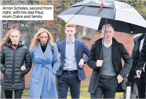  ??  ?? Arron Scholes, second from right, with his dad Paul, mum Claire and family