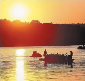  ?? CATHIE COWARD THE HAMILTON SPECTATOR FILE PHOTO ?? The sun sets at Bay Front Park in Hamilton last May. The Leap Day is a correction to counter the fact that Earth’s orbit isn’t precisely 365 days a year. The trip takes about six hours longer than that, NASA says.