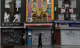  ?? Photograph: Toby Melville/Reuters ?? Boarded-up shops in London during the pandemic, April 2020. Covid-19 ripped a £400bn hole in the government’s finances