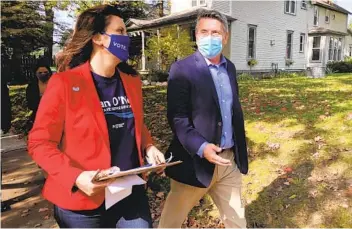  ?? JOHN FLESHER AP ?? Michigan Gov. Gretchen Whitmer campaigns with Dan O’Neil, a Democratic candidate for the Michigan House, in Traverse City, Mich., on Friday, a day after police announced a foiled plot to kidnap the governor.