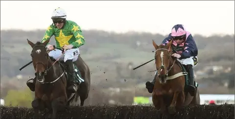  ??  ?? Jamie Codd riding Le Breuil (right) to victory last year at Cheltenham after an epic duel with Barry O’Neill on Paul Nolan’s Discorama (left).