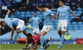  ??  ?? Early panic in the Manchester City area resulted in Gabriel Jesus (left) felling Anthony Martial to concede a penalty. Photograph: Matthew Peters/Manchester United/Getty Images