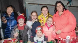  ?? Tia Lin-Dennehy, Conor Slattery, Aodháin and Sarah Slattery with Emma, Jeanie and Sandra O’Sullivan at the Ballyduff market. ??