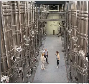  ?? AP/DANIEL COLE ?? Winemakers sample rose last week in the production facility of the 700-year-old Chateau Sainte-Roseline winery in the Provence region of southern France. French wine is included in new U.S. tariffs.