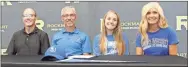  ?? Kevin Myrick ?? Coach Kent Mathis joined proud parents Barry and Neeve Owen, and Mary Ella Owen for the senior’s signing ceremony with Shorter University.