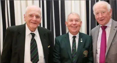  ??  ?? Eric Hynes and Joe Moloy with Greenore Captain Michael Mallie at the Capains dinner in Greenore Golf Club.