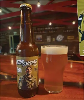  ?? (Photos: Courtesy the breweries) ?? IRON SWORD, a New England India Pale Ale brewed by Six-Pack (Super Heroes Beers) in memory of Sgt. Shoham Moshe Ben-Harush of the IDF’s Nachal Brigade, who was severely wounded in the Kerem Shalom base on Oct. 7 and died three weeks later.