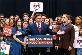  ?? (AP/Miami Herald/Daniel A. Varela) ?? Florida Gov. Ron DeSantis addresses the crowd before publicly signing what is called the Individual Freedom bill during a news conference Friday at Mater Academy Charter Middle/High School in Hialeah Gardens, Fla.