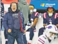  ?? CHARLES KRUPA/ASSOCIATED PRESS ?? Patriots head coach Bill Belichick shouts from the sideline Monday. New England will finish with a losing record for the first time since Belichick’s first season in 2000.