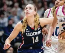  ?? Laurence Kesterson/Associated Press ?? UConn Dorka Juhasz (14) fights for position under the basket during Saturday's win at Villanova.