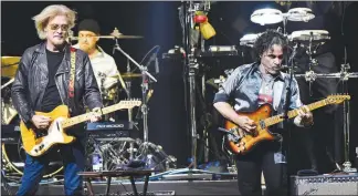  ?? ROB GRABOWSKI / INVISION / AP ?? Darryl Hall, left, and John Oates perform May 15 at the Allstate Arena in Rosemont, Ill. Hall & Oates, along with Tears for Fears, headline Friday at T-mobile Arena.