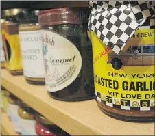 ?? – MCT PHOTOS ?? At the Mustard Museum in Middleton, Wisc., you’ll find varieties of the condiment from 79 countries.
