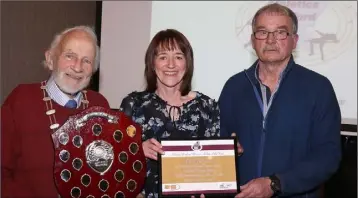  ??  ?? Anne Gilshinan (Slaney Olympic), Masters athlete of the year, with Nicky Cowman (President, Wexford Atheltics) and Paddy Morgan (Chairman, Wexford Athletics).