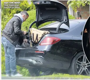  ??  ?? GOT THE BOOT Star loading up back of his Merc
