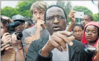  ?? Picture: GALLO IMAGES ?? NEGOTIATOR: Mabizela talks to protesting students, a practice that has won him support among the student body