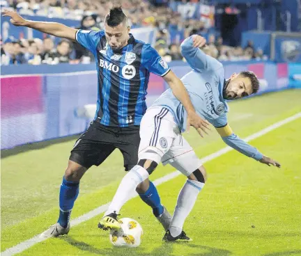 ?? THE CANADIAN PRESS FILES ?? Saphir Taider, left, shown battling New York City FC’s David Villa during MLS action earlier this season, believes the Impact need to win their final three games of the season to have any hope of making the playoffs. Montreal hosts Columbus on Saturday night.