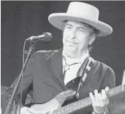  ?? FRED TANNEAU/GETTY-AFP 2012 ?? Bob Dylan is unlikely to attend the opening of a museum and archive celebratin­g his work.