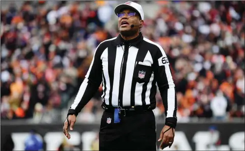  ?? (File Photo/AP/Emilee Chinn) ?? Referee Ronald Torbert works Jan. 8 during an NFL football game between the Cincinnati Bengals and Baltimore Ravens in Cincinnati. Stories circulatin­g online incorrectl­y claim the NFL is investigat­ing Torbert because his son made a large wager on the Kansas City Chiefs before they defeated the Cincinnati Bengals on Jan. 29.