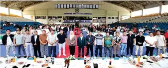  ?? ?? Lawmakers pose at a public consultati­on in Lamitan City.