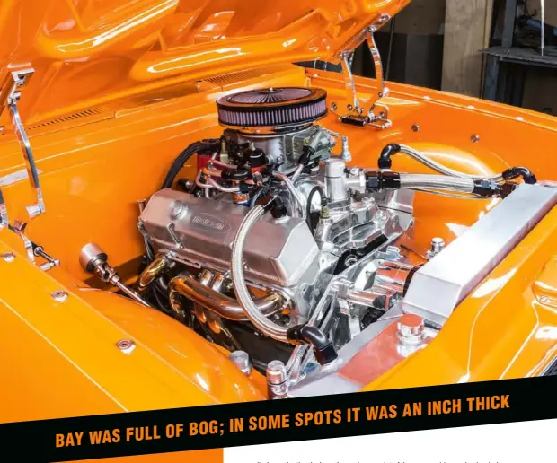  ??  ?? ENGINE BAY: You could spend a few hours just looking at all the cool little details here. Darren custom-fabricated the two tanks either side of the radiator – again, not a weld in sight – and the radiator shroud. Rather than have an ugly radiator cap...