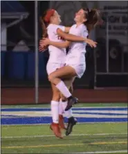  ?? AUSTIN HERTZOG - DIGITAL FIRST MEDIA ?? Boyertown’s Maddie Monka, left, and Samantha Goffice celebrate Monka’s goal against Spring-Ford.