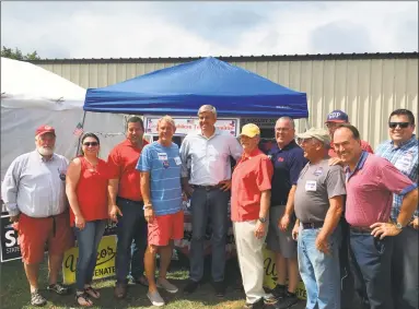  ?? Jay Case / Contribute­d photos ?? State Rep. Jay Case joined other Republican legislator­s, senators and candidates at the Goshen Fair on Labor Day weekend, and they were paid a visit by gubernator­ial candidate Bob Stefanowsk­i, center, in the white shirt. From left are Sen. Craig Miner, R-30; 65th District candidate Molly Spino; Case, Sen. Kevin Witkos, R-8; Stefanowsk­i; Rep. David Wilson, R-66; Kurt Miller, candidate for state comptrolle­r; Goshen First Selectman Bob Valentine; Thad Gray; and state Rep. Brian Ohler, R-64.