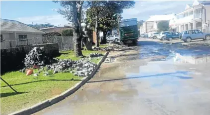  ??  ?? HARD TO NEGOTIATE: A photograph of Biscay Road after rain shows the state of the road surface, which is a nightmare for residents of the street, as well as people driving into town from the river side