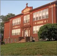  ?? MEDIANEWS GROUP FILE PHOTO ?? The cornerston­e of the St. Aloysius Parish School building on North Hanover Street was laid in 1913. The building will be used a shelter for the homeless.