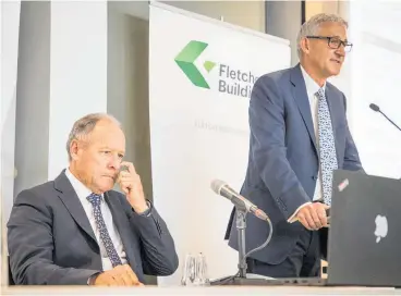  ?? Picture / Greg Bowker ?? Sir Ralph Norris (left) and Fletcher Building chief executive Ross Taylor at a media briefing after Norris stood down following huge losses.