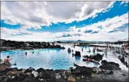  ??  ?? The naturally heated Myvatn Nature Baths offer a great view of north Iceland’s volcanic countrysid­e.