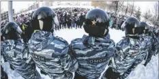  ?? AP PHOTO/ANTON BASANAYEV ?? Police block a protest against the jailing of opposition leader Alexei Navalny in Yekaterinb­urg, Russia, on Jan. 23, 2021.