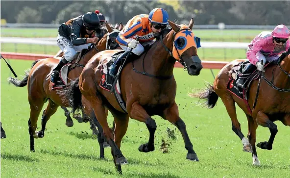  ??  ?? Melody Belle and rider Opie Bosson power clear in the Haunui Farm Classic yesterday.