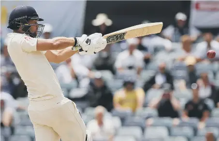  ??  ?? Dawid Malan hits out for England on the final day of the third Test at the WACA in Perth.