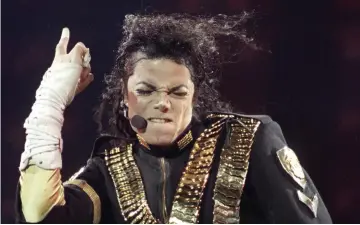  ?? — Reuters file photo ?? Jackson performs during a concert in Sao Paulo, Brazil, on Oct 15, 1993.