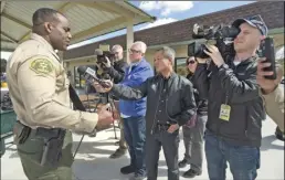 ?? ?? Dan Watson/ The Signal Los Angeles County Sheriff’s Lt. John Hayes answers questions from the media at Wednesday’s Emergency Vehicle Operation Center exercise.
