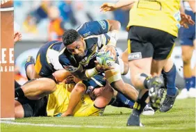  ?? Photo / Getty Images ?? Isi Naisarani drives for the tryline against the Canes.