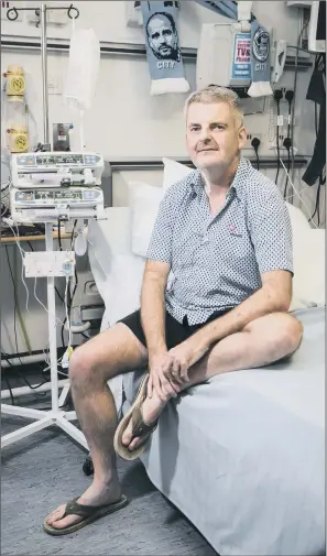  ?? PICTURE: PA WIRE. ?? Gareth Evans, 45, of Stockport, at Wythenshaw­e Hospital in Manchester. Mr Evans, has been on the heart transplant waiting list since February 2009, longer than anyone else in the UK. LONG WAIT: