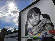  ?? KYLE ROBERTSON / DISPATCH ?? A billboard in downtown Columbus promotes Nationwide Children’s Hospital’s new “On Our Sleeves” campaign to address the mental-health needs of children and help engage the public.