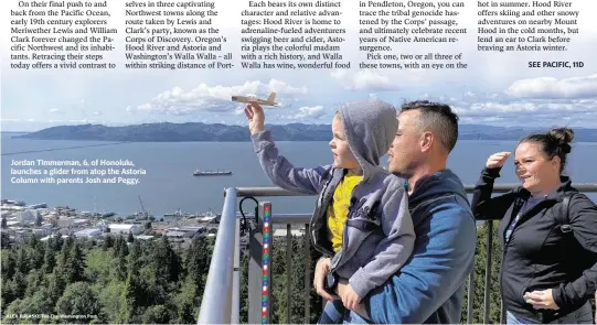  ?? ?? Jordan Timmerman, 6, of Honolulu, launches a glider from atop the Astoria Column with parents Josh and Peggy.