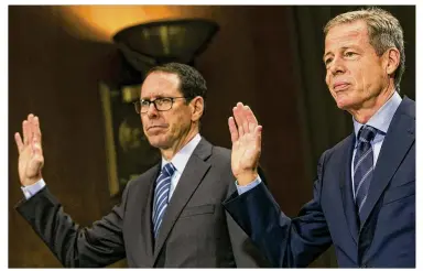  ?? KRISTOFFER TRIPPLAAR / SIPA USA 2016 ?? Randall Stephenson (left), chairman and CEO of AT&amp;T, and Jeffrey Bewkes, chairman and CEO of Time Warner, are sworn in before a U.S. Senate panel in December 2016. A federal judge is expected to issue his opinion today on the government’s effort to block AT&amp;T’s merger with Time Warner.