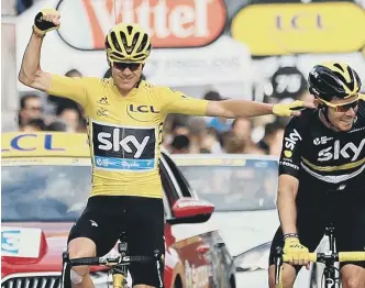  ??  ?? Triumphant: Chris Froome enjoys his moment of success in Paris yesterday