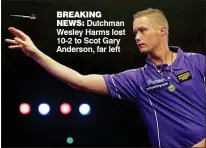  ??  ?? BreaKIngne­Ws: Dutchman Wesley Harms lost 10-2 to Scot Gary Anderson, far left